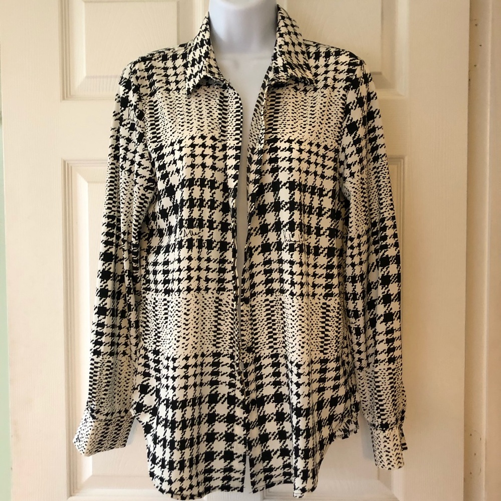 Elegant button down blouse. Worn once.